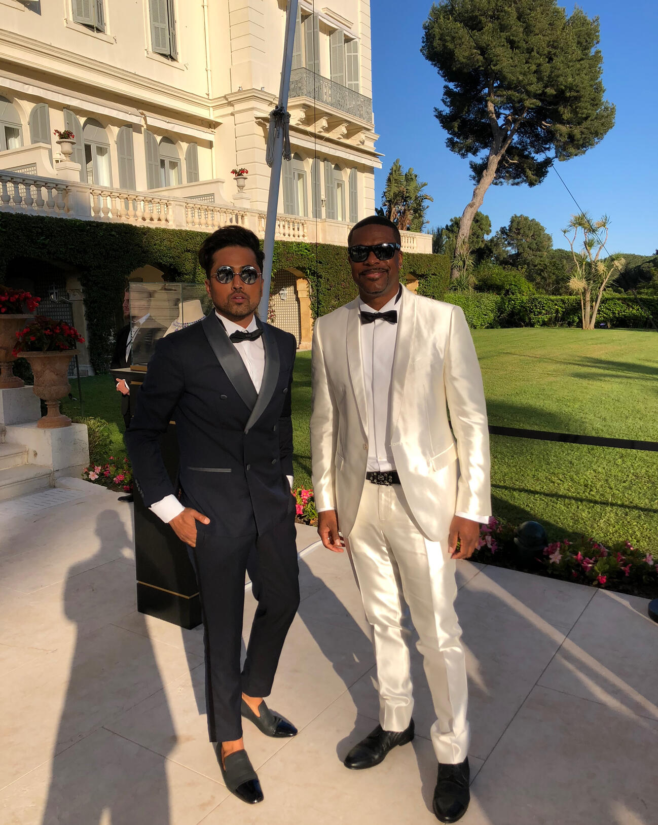 Actor Chris Tucker with Samuel Sohebi at the amfAR Gala during the Cannes Film Festival at Hotel du Cap-Eden-Roc in Cap d’Antibes, France.