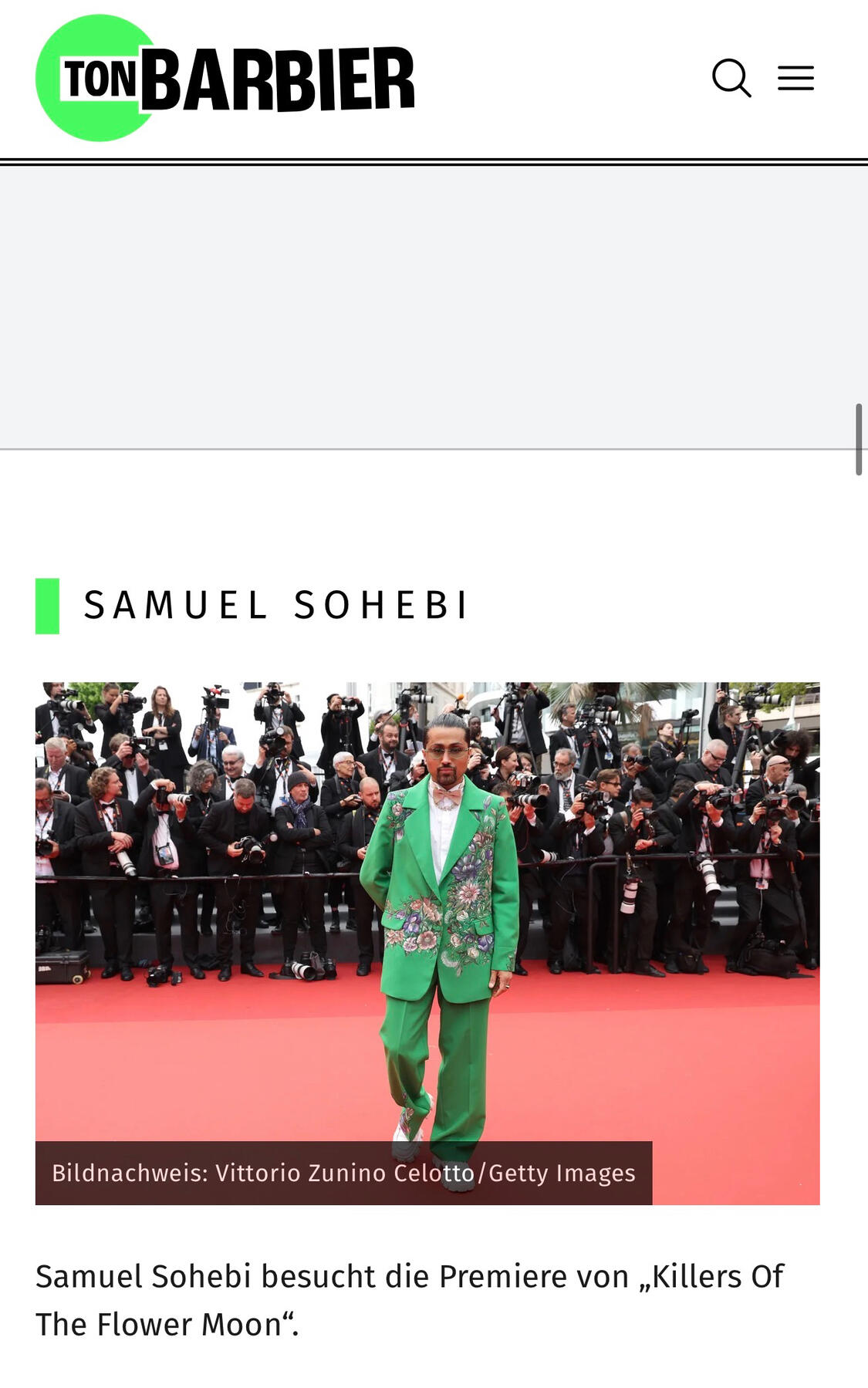 Samuel Sohebi on the red carpet at the Cannes Film Festival 2023 wearing a green embroidered suit, featured among best dressed men